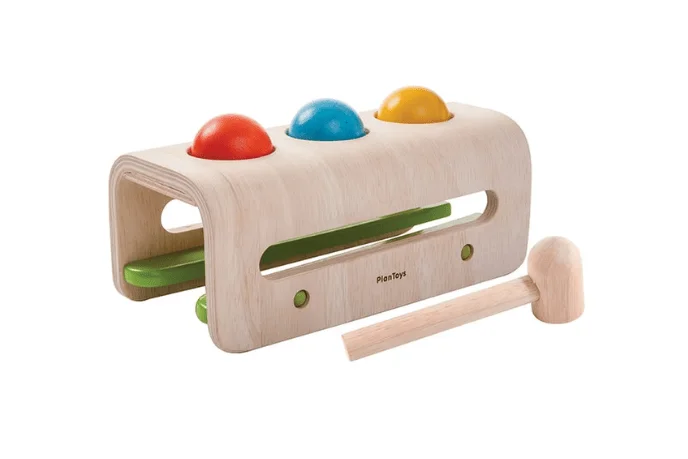 intricately carved wooden toys                   Plan Toys Hammer Balls