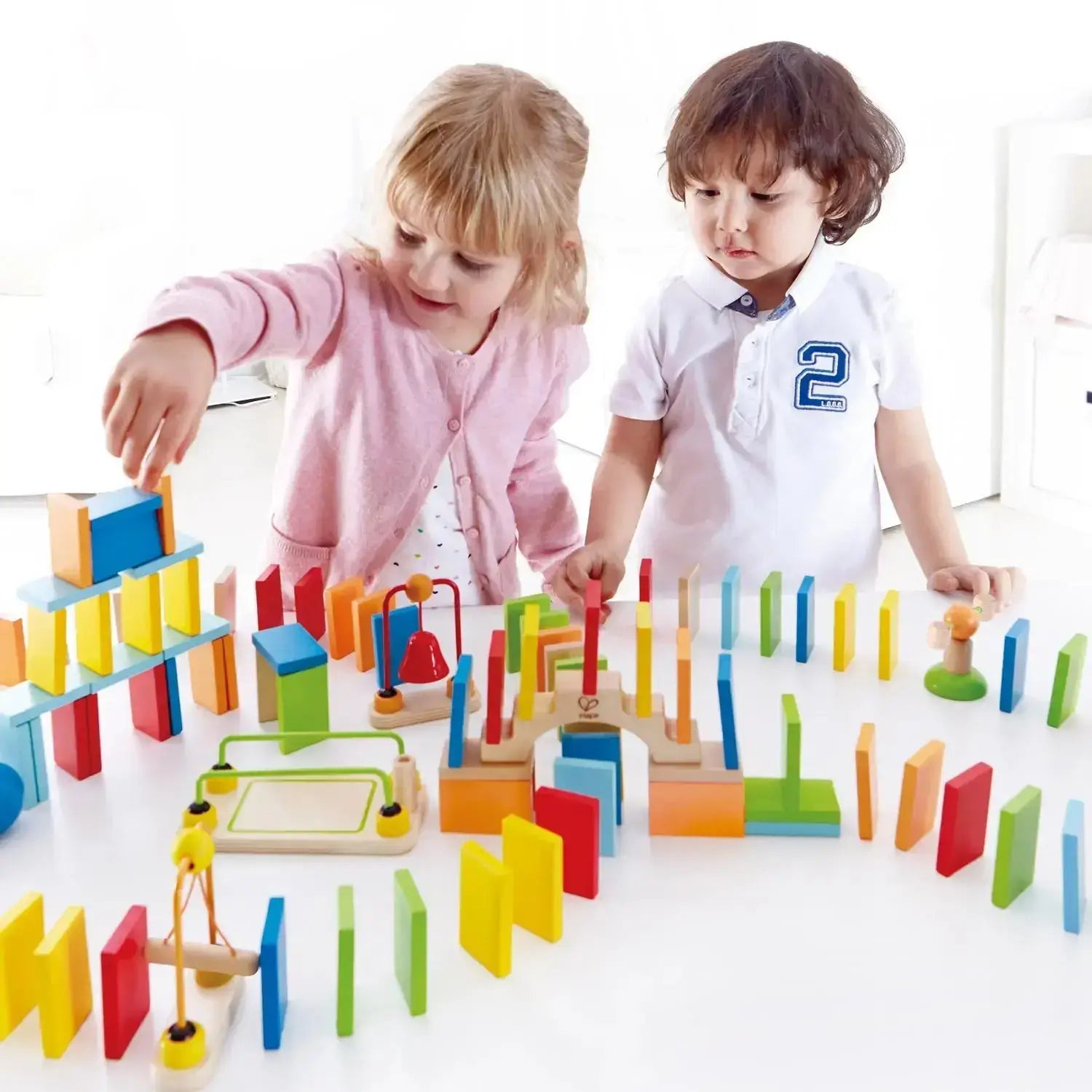 colorful and cheerful wooden toys                   Hape Wooden Dynamo Dominoes