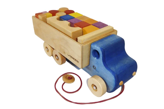 skillfully crafted wooden toys                   Wooden Blocks In A Truck